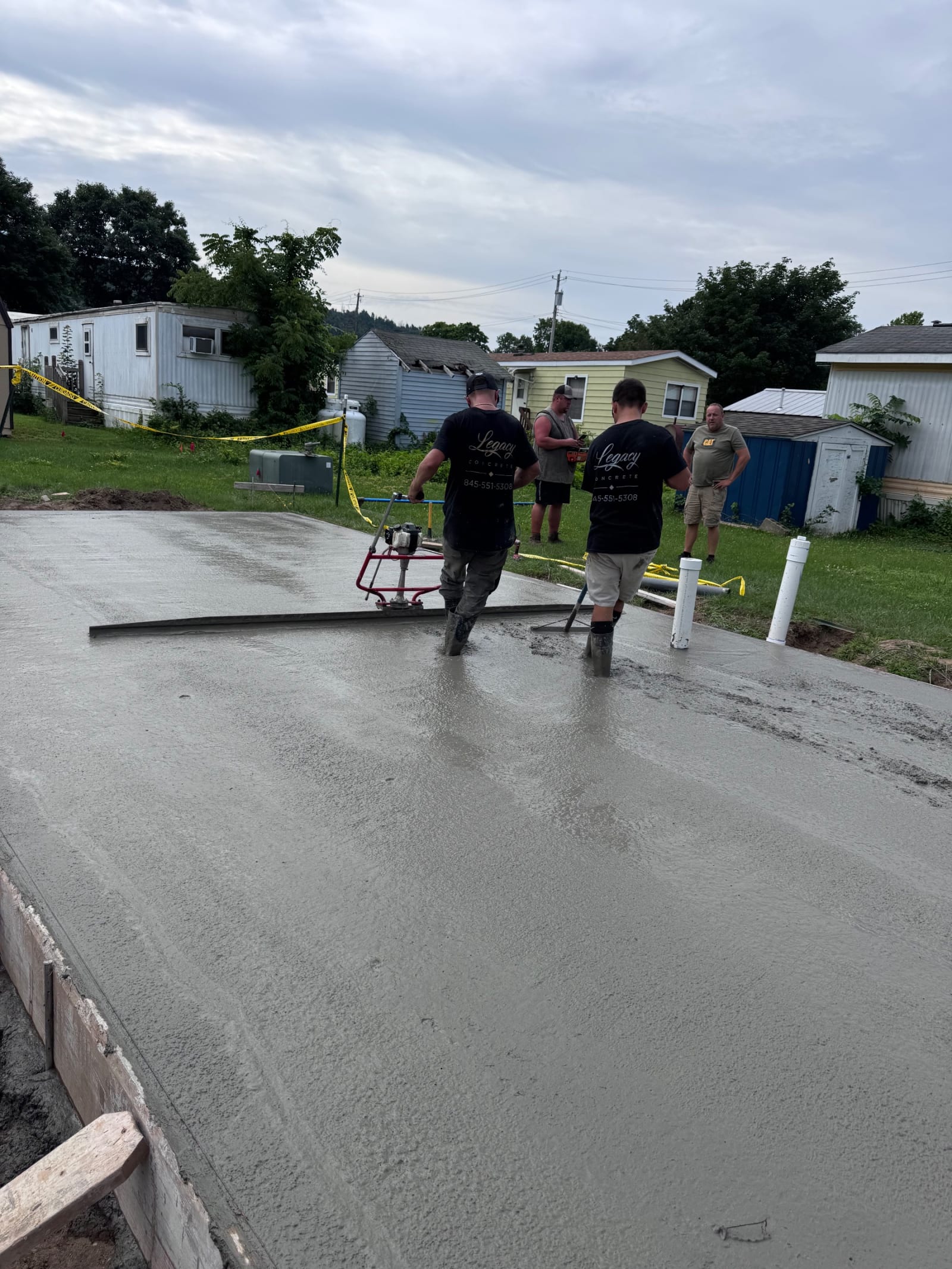 Crew screeding the drive by Legacy Concrete, Poughkeepsie